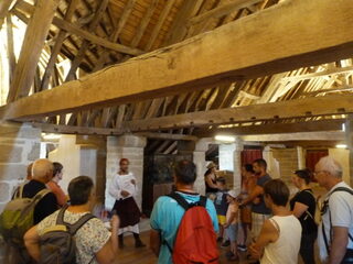 Visite guidée théâtrale des combles de la Porte Saint-Michel Château-musée de Gu